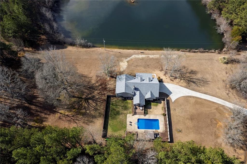 2133 Mann Road Douglasville, GA 30134 - Photo 4 of 69 an aerial view of a house with outdoor space