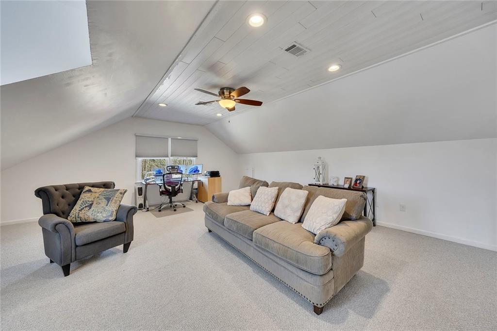2133 Mann Road Douglasville, GA 30134 - Photo 42 of 69 a living room with furniture and white walls