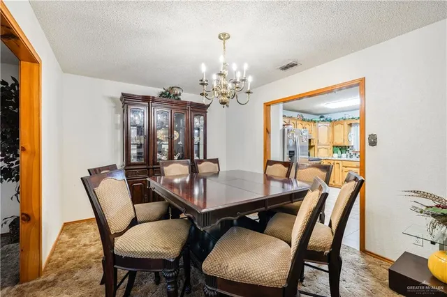 a view of a livingroom with furniture and a window