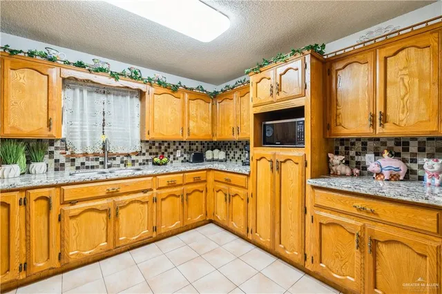 a bedroom with furniture and wooden floor