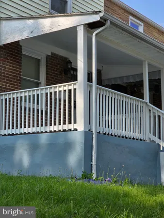 a view of a house with a small yard