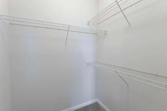 a view of a room with racks on the wall