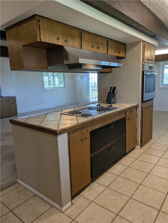 155 Buffalo Road George West, TX 78022 - Photo 16 of 39 a kitchen with stainless steel appliances granite countertop a sink and a stove