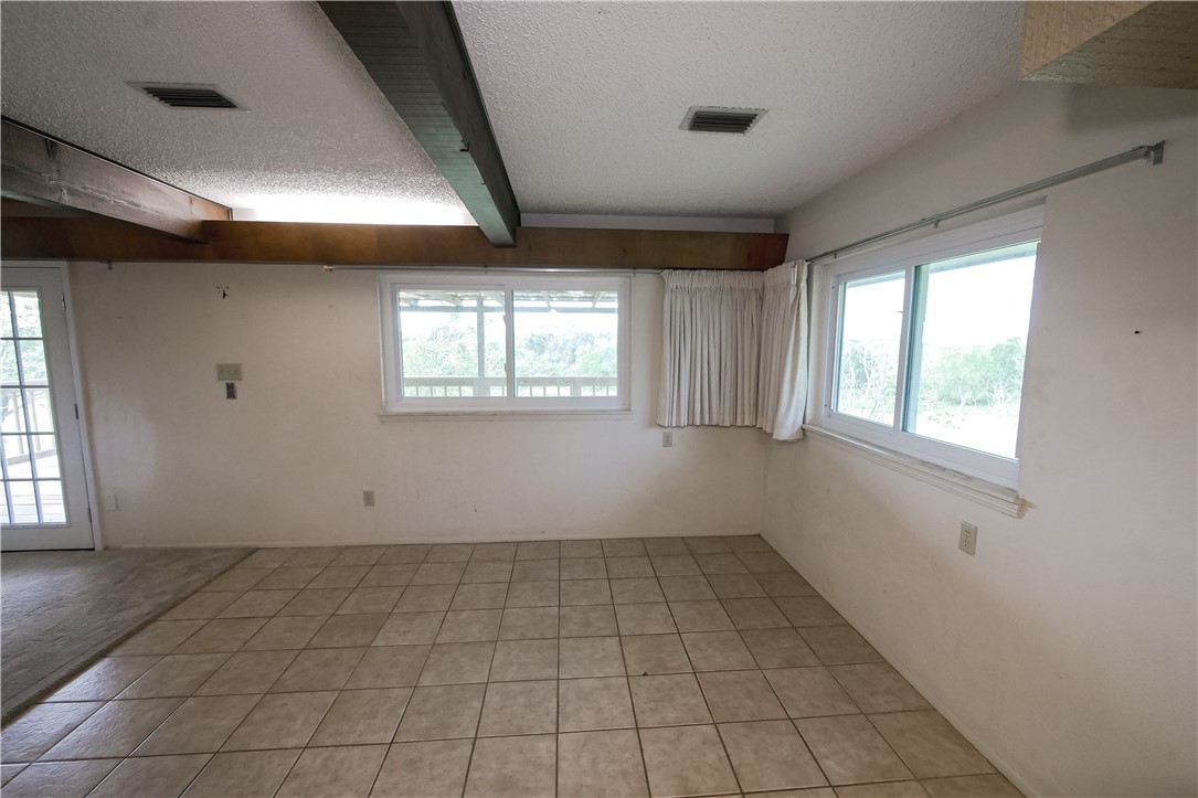 155 Buffalo Road George West, TX 78022 - Photo 20 of 39 a view of an empty room and window