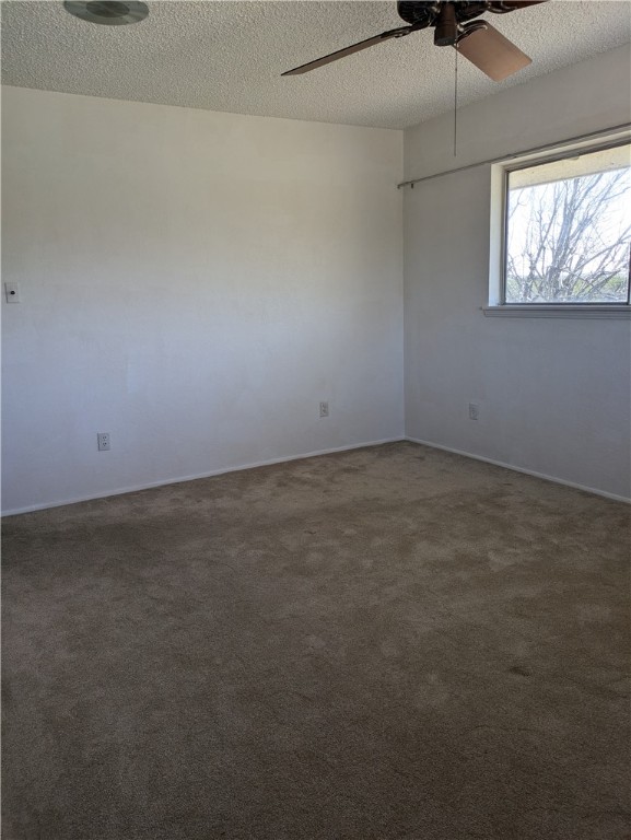 155 Buffalo Road George West, TX 78022 - Photo 23 of 39 an empty room with a window