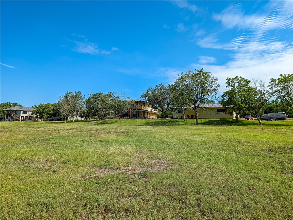 155 Buffalo Road George West, TX 78022 - Photo 38 of 39 a view of outdoor space with deck and yard