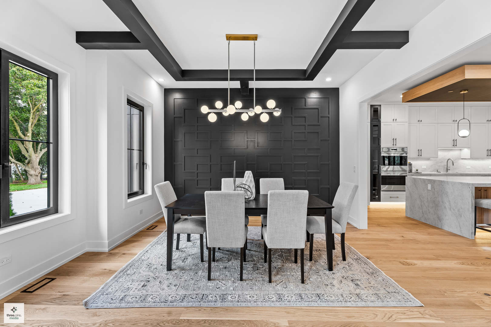 3005 Highland Road Northbrook, IL 60062 - Photo 15 of 68 a dining room with wooden floor and a chandelier