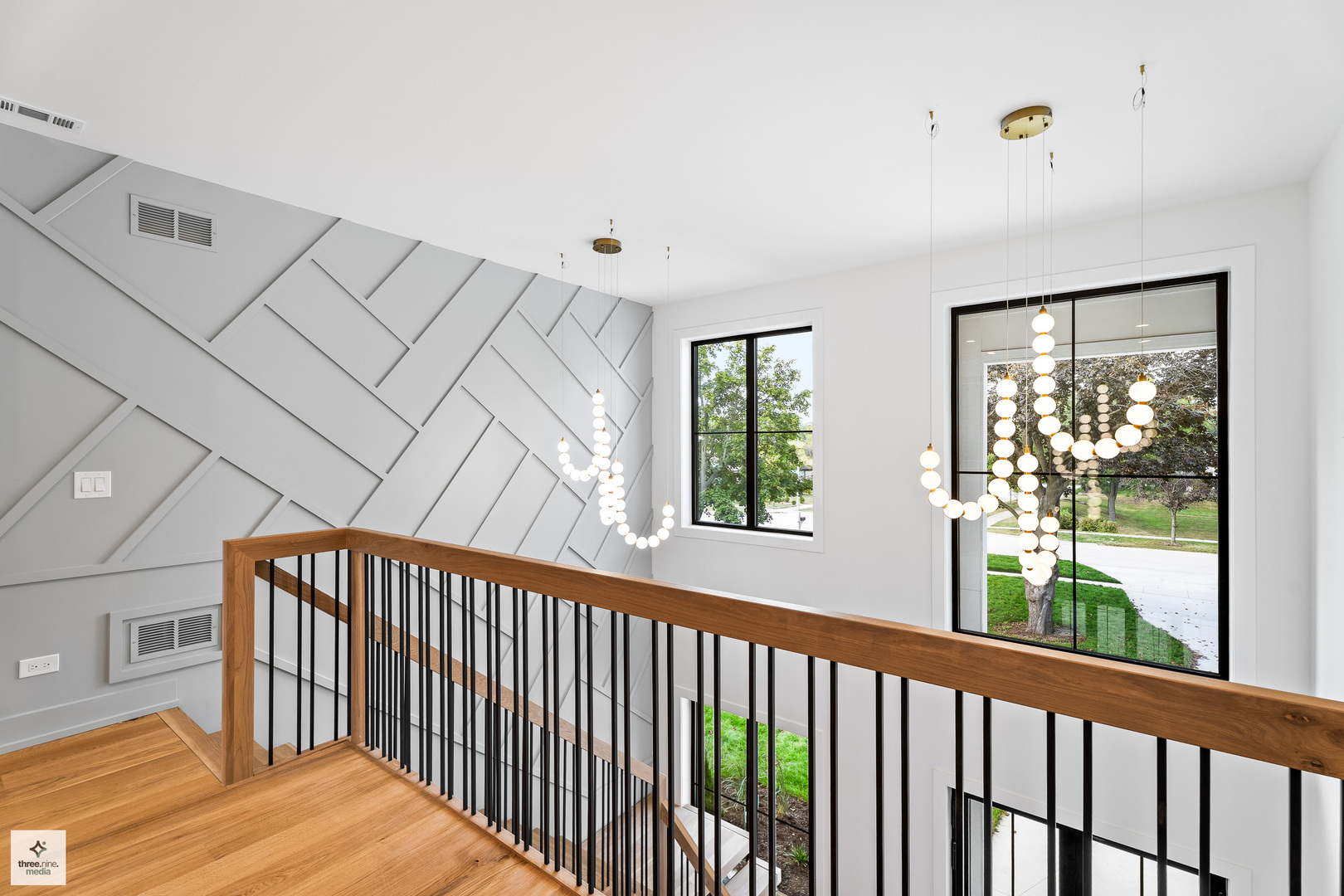 3005 Highland Road Northbrook, IL 60062 - Photo 23 of 68 a view of a hallway with wooden floor and windows