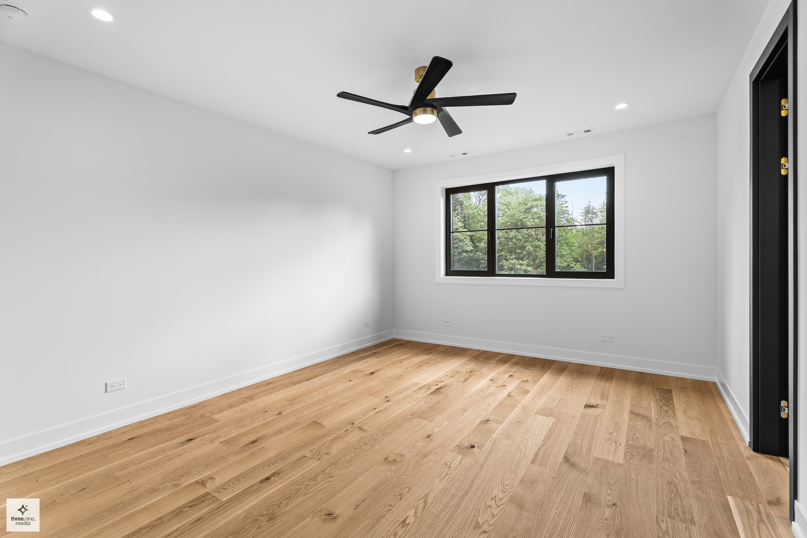 3005 Highland Road Northbrook, IL 60062 - Photo 37 of 68 a view of empty room with wooden floor and fan
