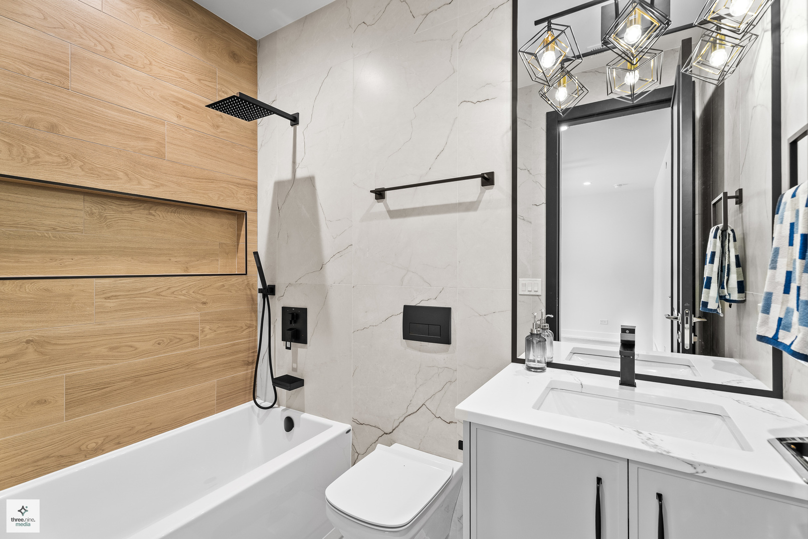 3005 Highland Road Northbrook, IL 60062 - Photo 39 of 68 a bathroom with a granite countertop sink toilet and shower