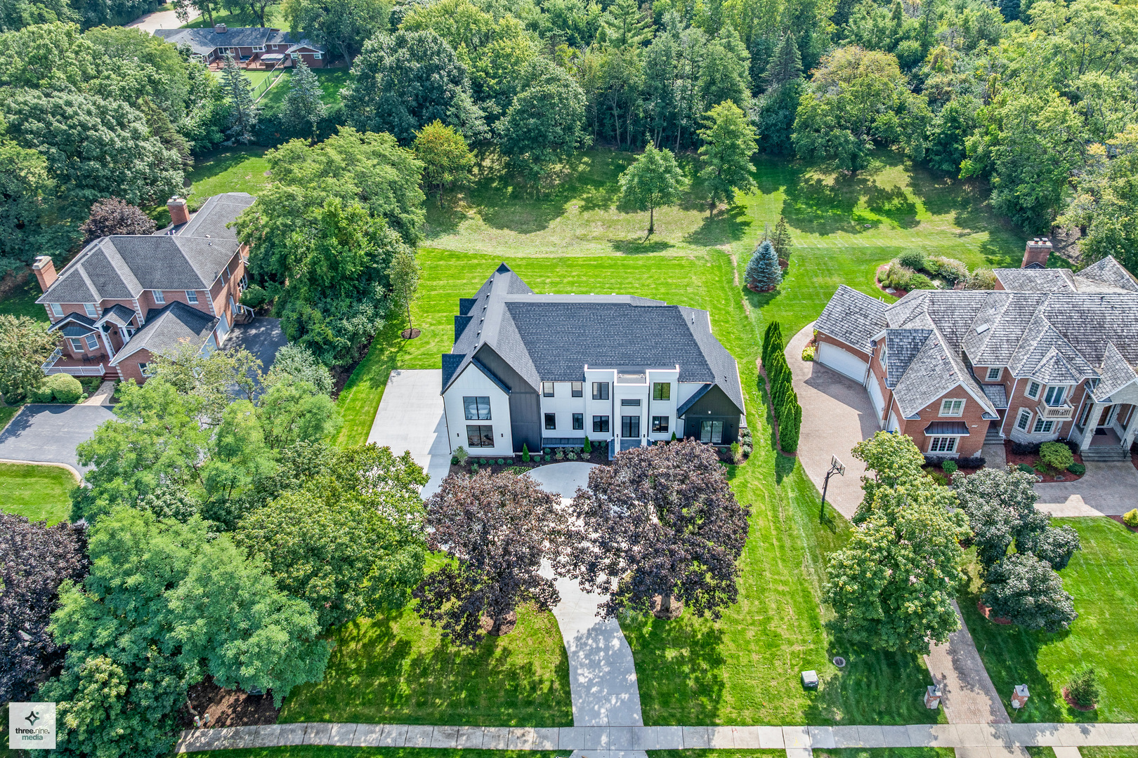 3005 Highland Road Northbrook, IL 60062 - Photo 60 of 68 an aerial view of a house with garden space and trees all around