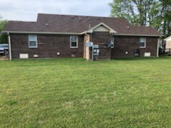 217 Hunter Drive Columbia, TN 38401 - Photo 7 of 7 a front view of a house with garden