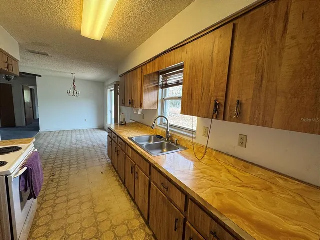 a bathroom with a sink a mirror and a bathtub