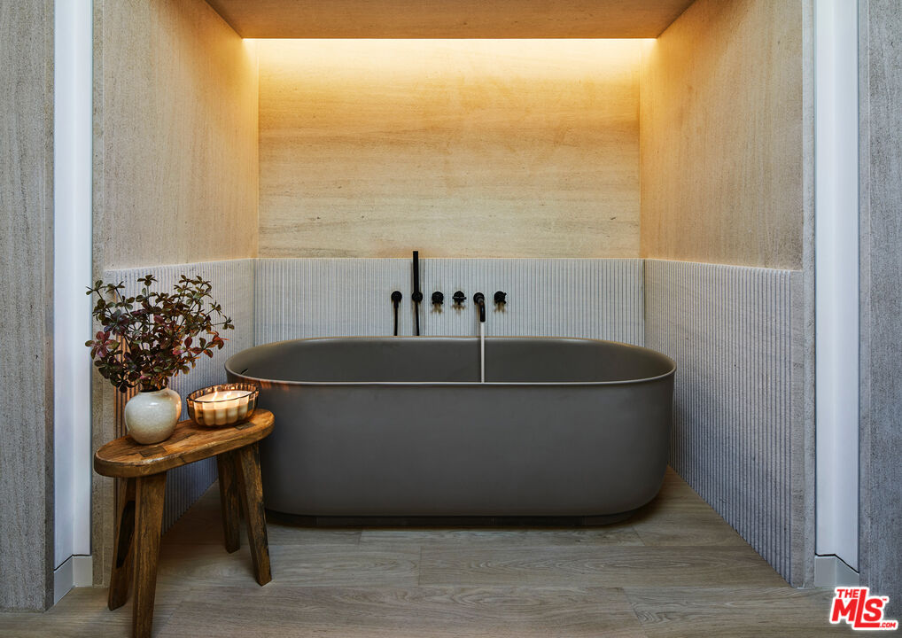 23515 Malibu Colony Road Malibu, CA 90265 - Photo 14 of 22 a living room with furniture and flowers