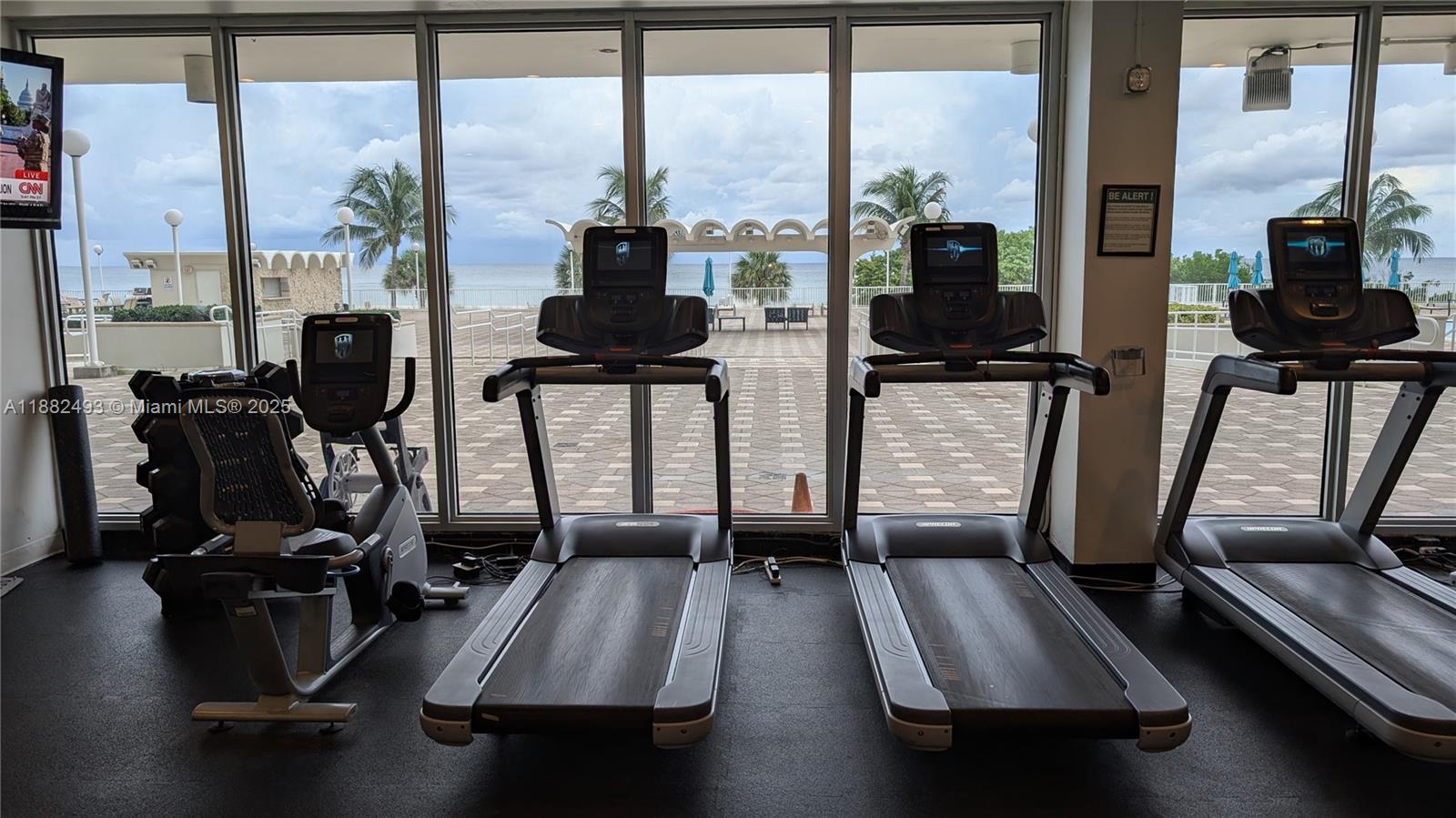 5701 Collins Avenue, Unit 1105 Miami Beach, FL 33140 - Photo 25 of 26 a view of a room with gym equipment on the floor