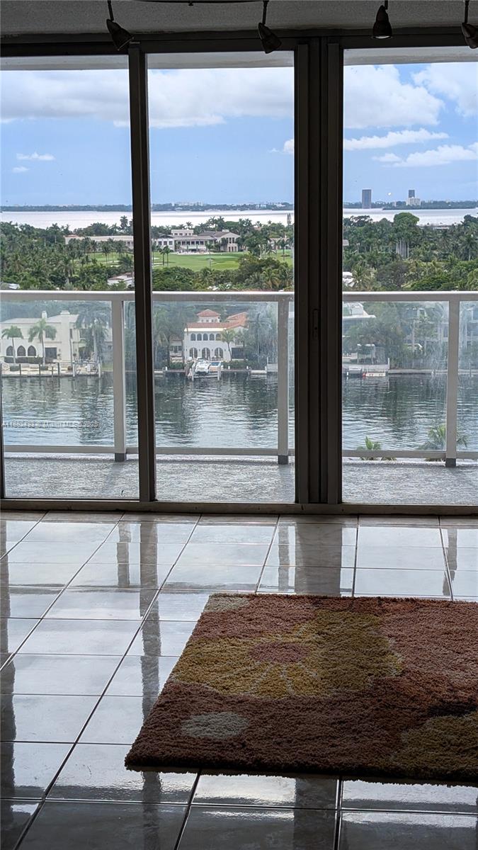 5701 Collins Avenue, Unit 1105 Miami Beach, FL 33140 - Photo 6 of 26 a view of swimming pool from a window