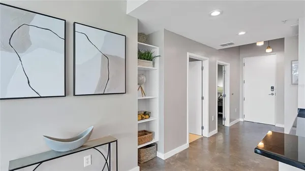 a view of entryway with wooden floor