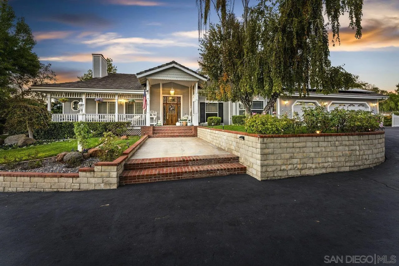 1728 Rancho Judith Alpine, CA 91901 - Photo 1 of 68 a front view of a house with a garden and trees