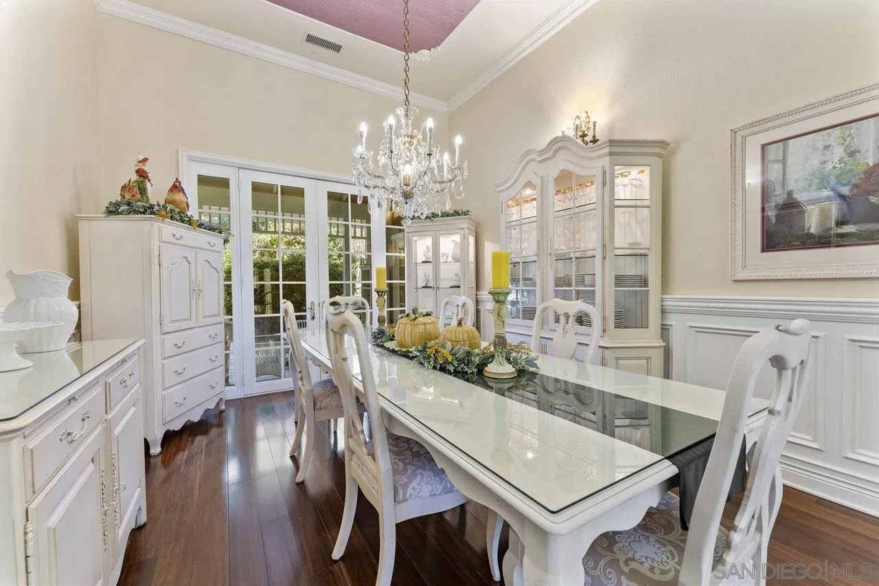 1728 Rancho Judith Alpine, CA 91901 - Photo 12 of 68 a view of a dining room with furniture a chandelier and wooden floor