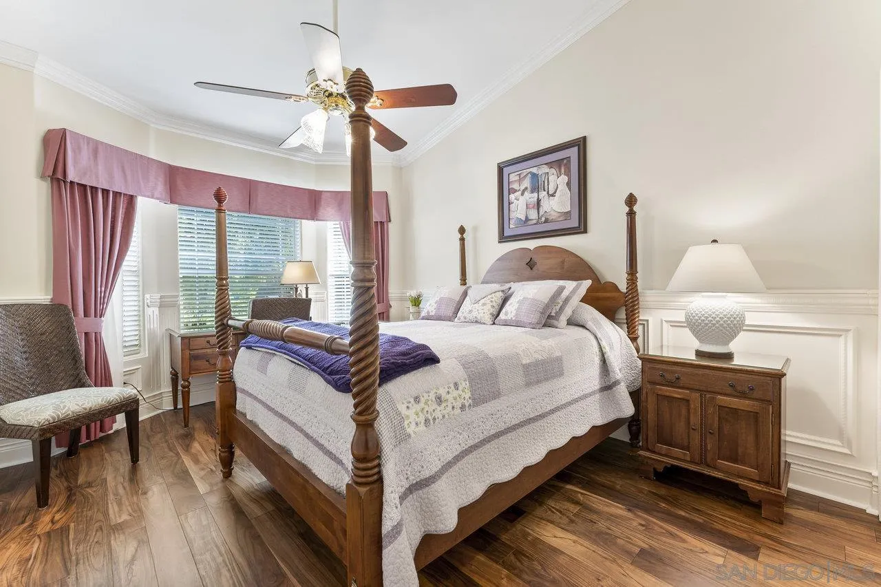 1728 Rancho Judith Alpine, CA 91901 - Photo 18 of 68 a bedroom with a bed and a chandelier