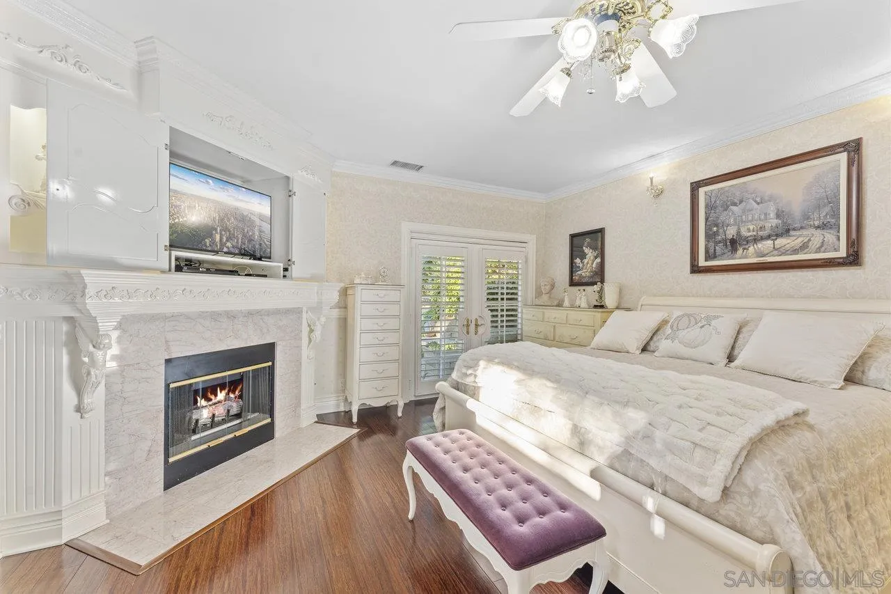 1728 Rancho Judith Alpine, CA 91901 - Photo 26 of 68 a spacious bedroom with a bed and a fireplace