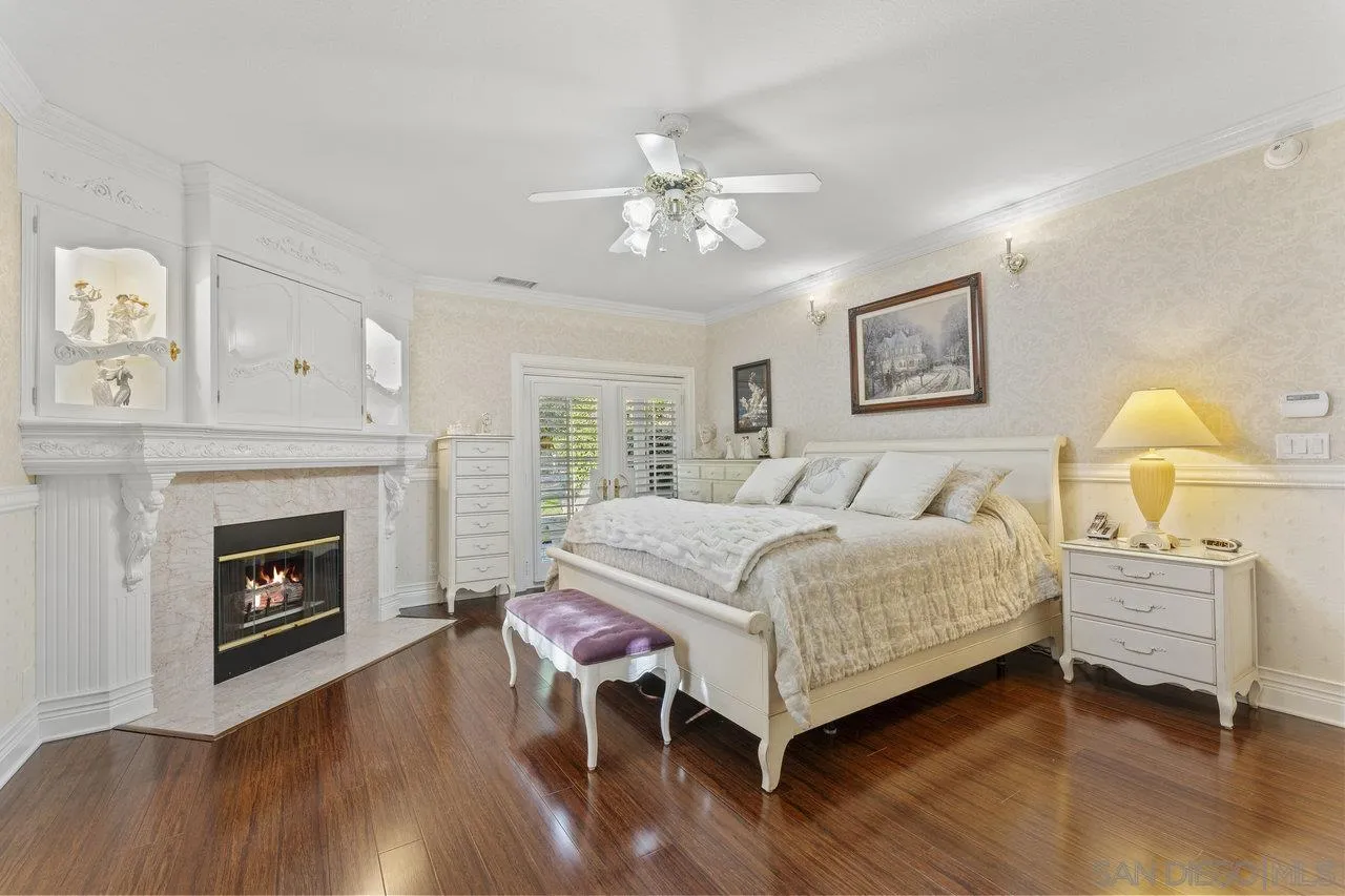 1728 Rancho Judith Alpine, CA 91901 - Photo 27 of 68 a bedroom with a bed and a fireplace