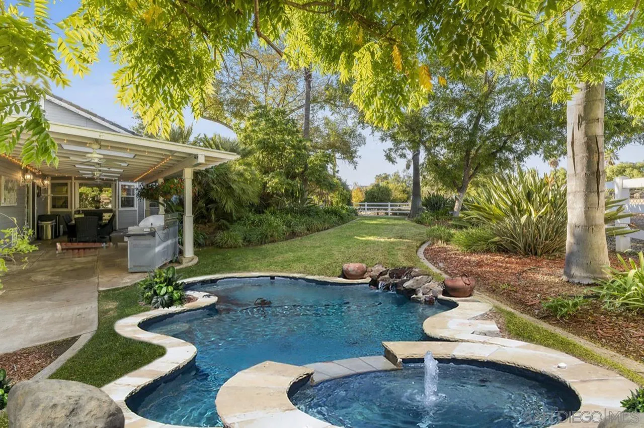 1728 Rancho Judith Alpine, CA 91901 - Photo 3 of 68 a view of a patio with table and chairs potted plants and large tree