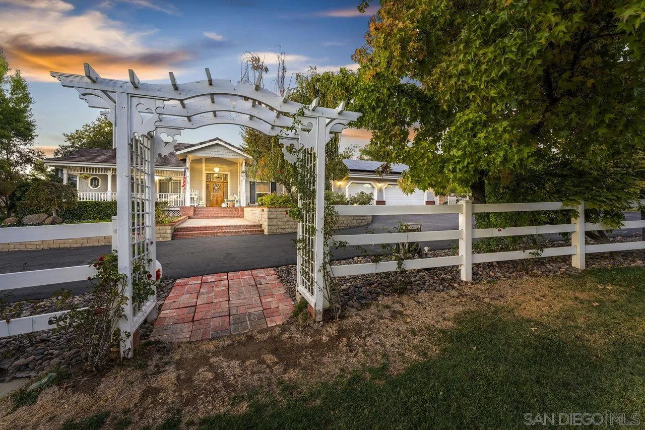 1728 Rancho Judith Alpine, CA 91901 - Photo 6 of 68 a view of a big yard with large tree and wooden fence