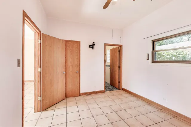 a view of an empty room and window