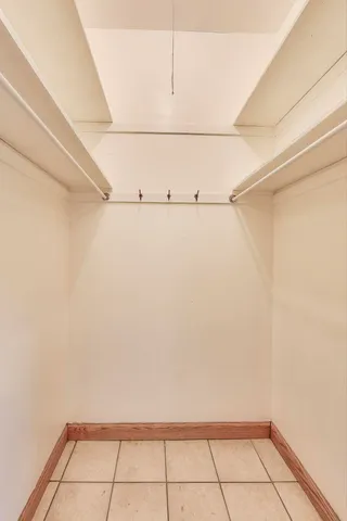 a view of empty room with windows