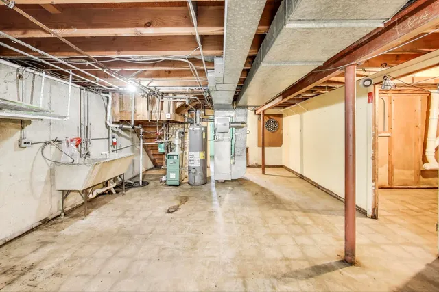 a view of a garage with wooden floors
