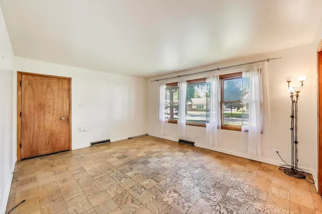 an empty room with windows