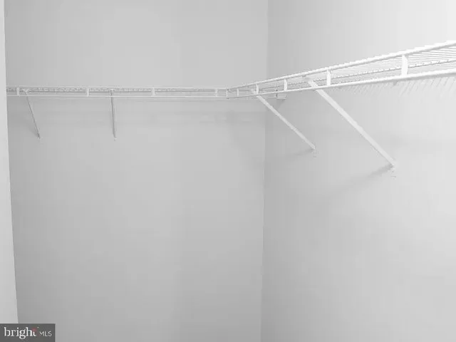 a view of a room with racks on the wall