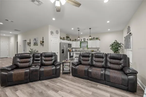 a view of a livingroom with wooden floor