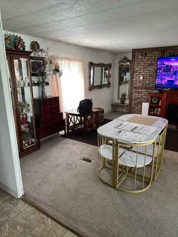 a view of a dining room with furniture