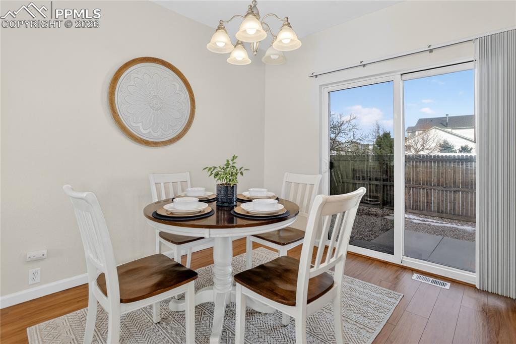 7682 Capel Point Peyton, CO 80831 - Photo 9 of 24 Dining area w/ walk-out to patio