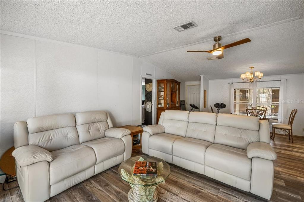 13205 Star Road Brooksville, FL 34613 - Photo 13 of 40 a living room with furniture