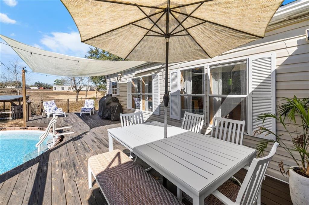 13205 Star Road Brooksville, FL 34613 - Photo 25 of 40 an outdoor space with furniture