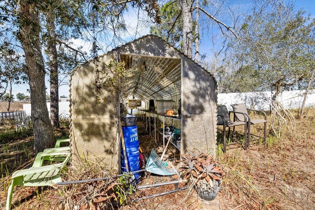 13205 Star Road Brooksville, FL 34613 - Photo 33 of 40 a view of path along with trees