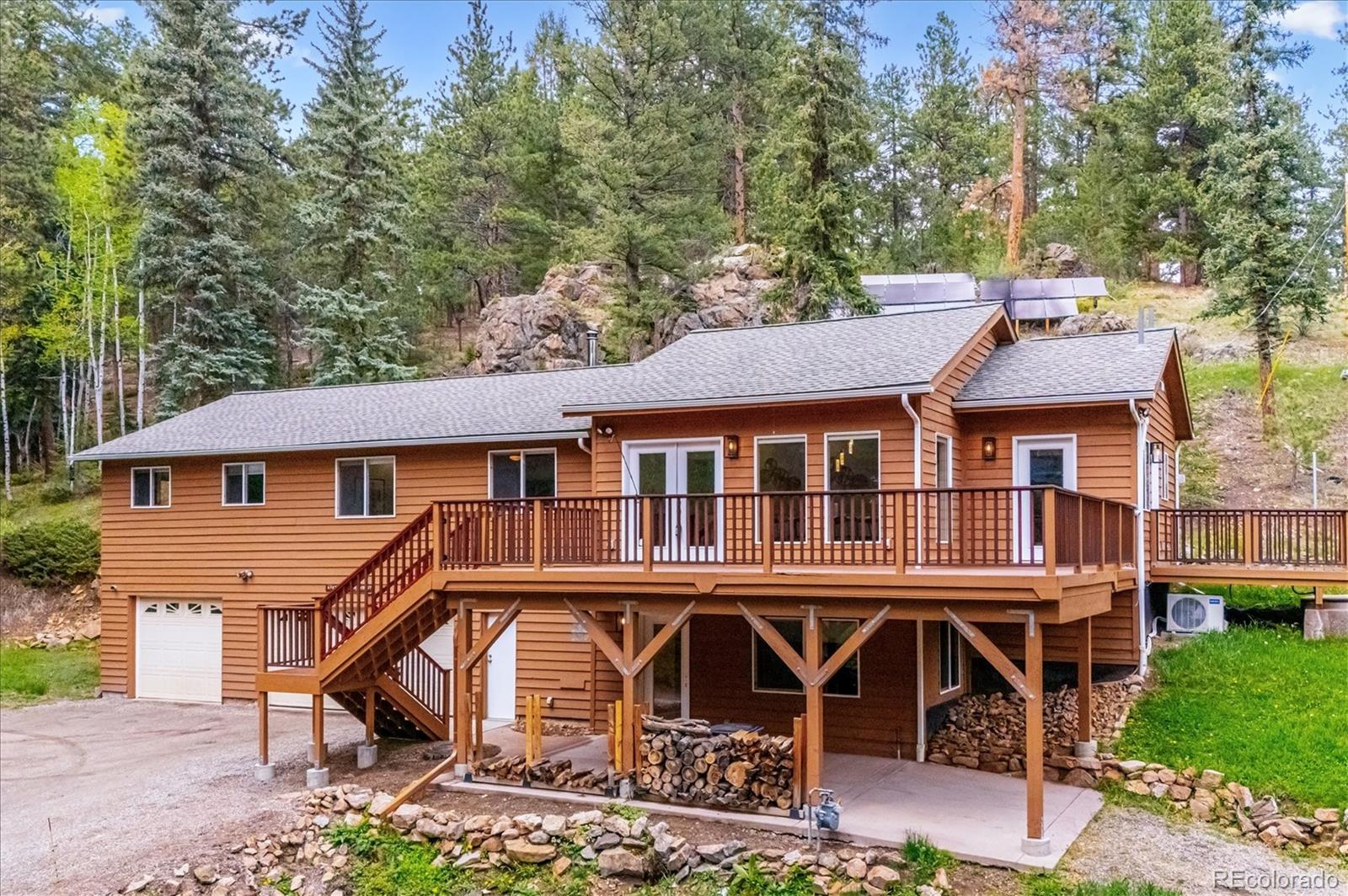 6747 South Brook Forest Road Evergreen, CO 80439 - Photo 38 of 49 an aerial view of a house