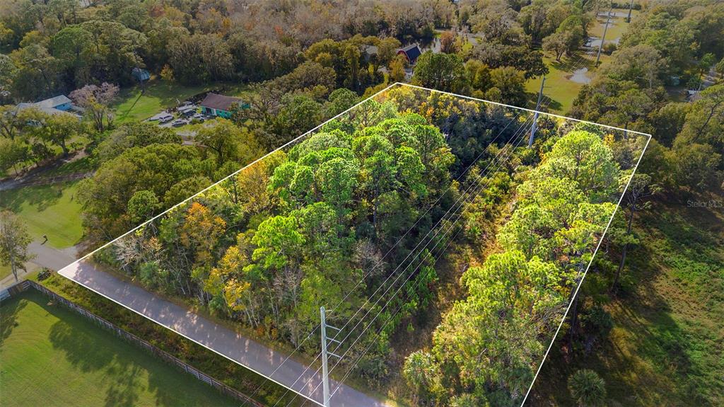 Pinedale Road Edgewater, FL 32132 - Photo 3 of 16 a view of a lake from a balcony