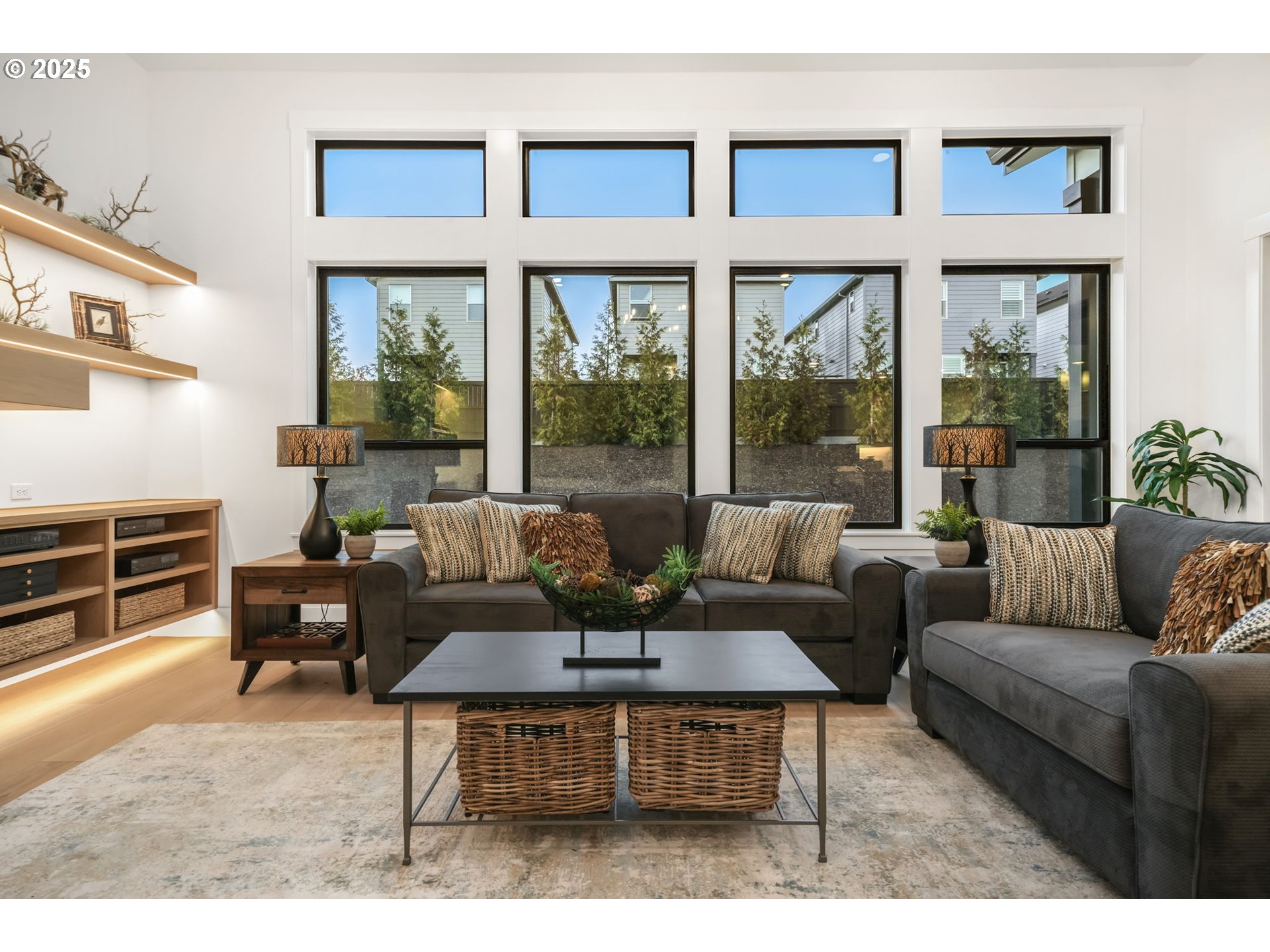 818 Northwest 173rd Street Ridgefield, WA 98642 - Photo 11 of 44 a living room with furniture wooden floor and a large window