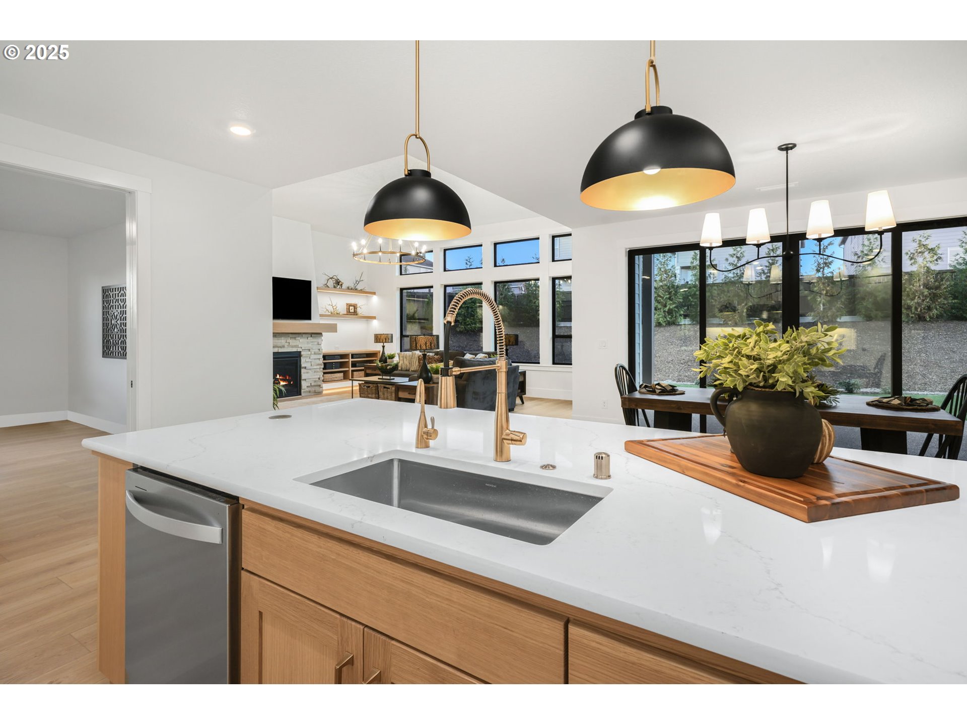 818 Northwest 173rd Street Ridgefield, WA 98642 - Photo 18 of 44 a kitchen with stainless steel appliances granite countertop a sink a counter space and a view of living room