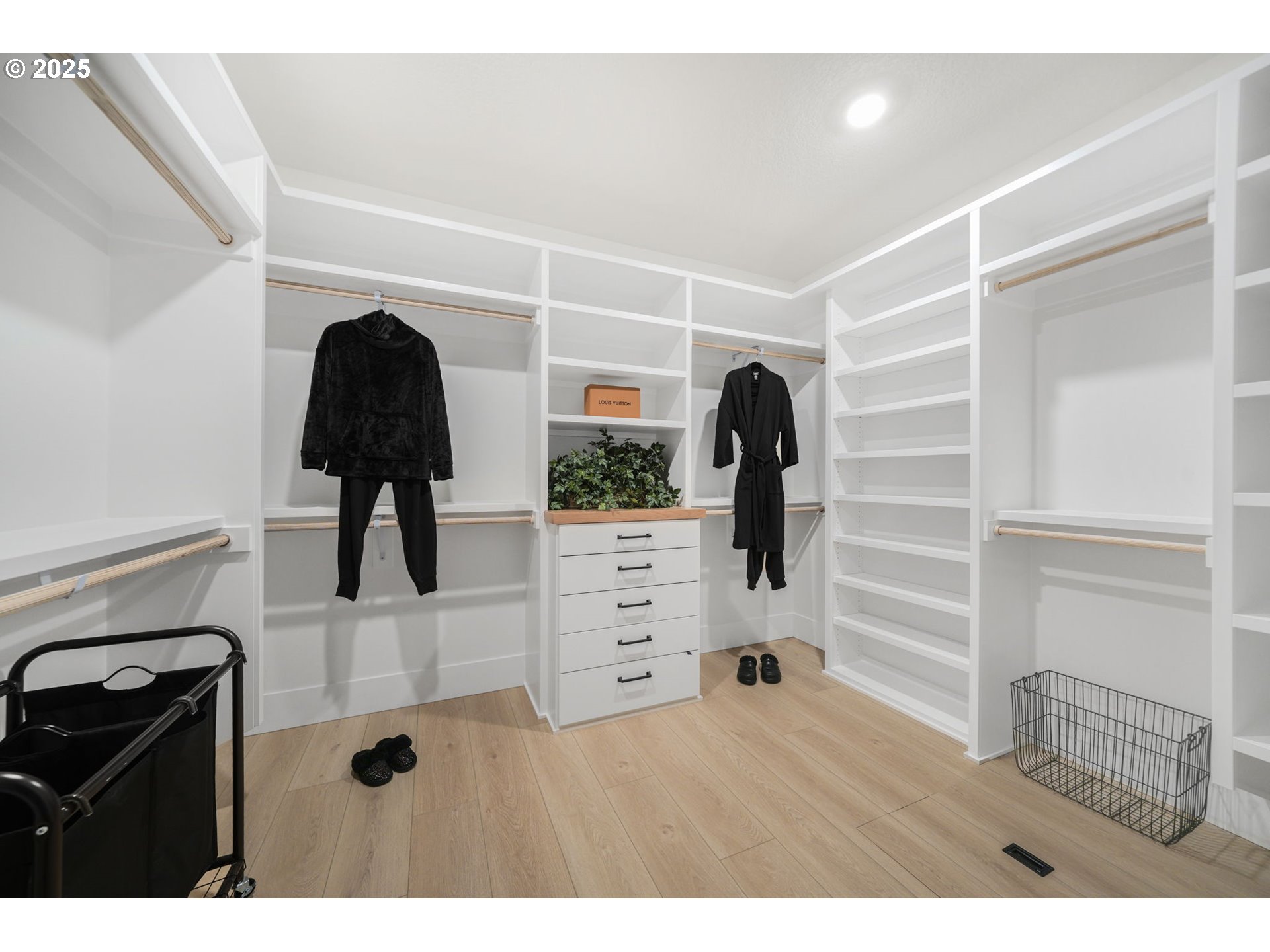 818 Northwest 173rd Street Ridgefield, WA 98642 - Photo 36 of 44 a view of walk in closet with clothes and shoes