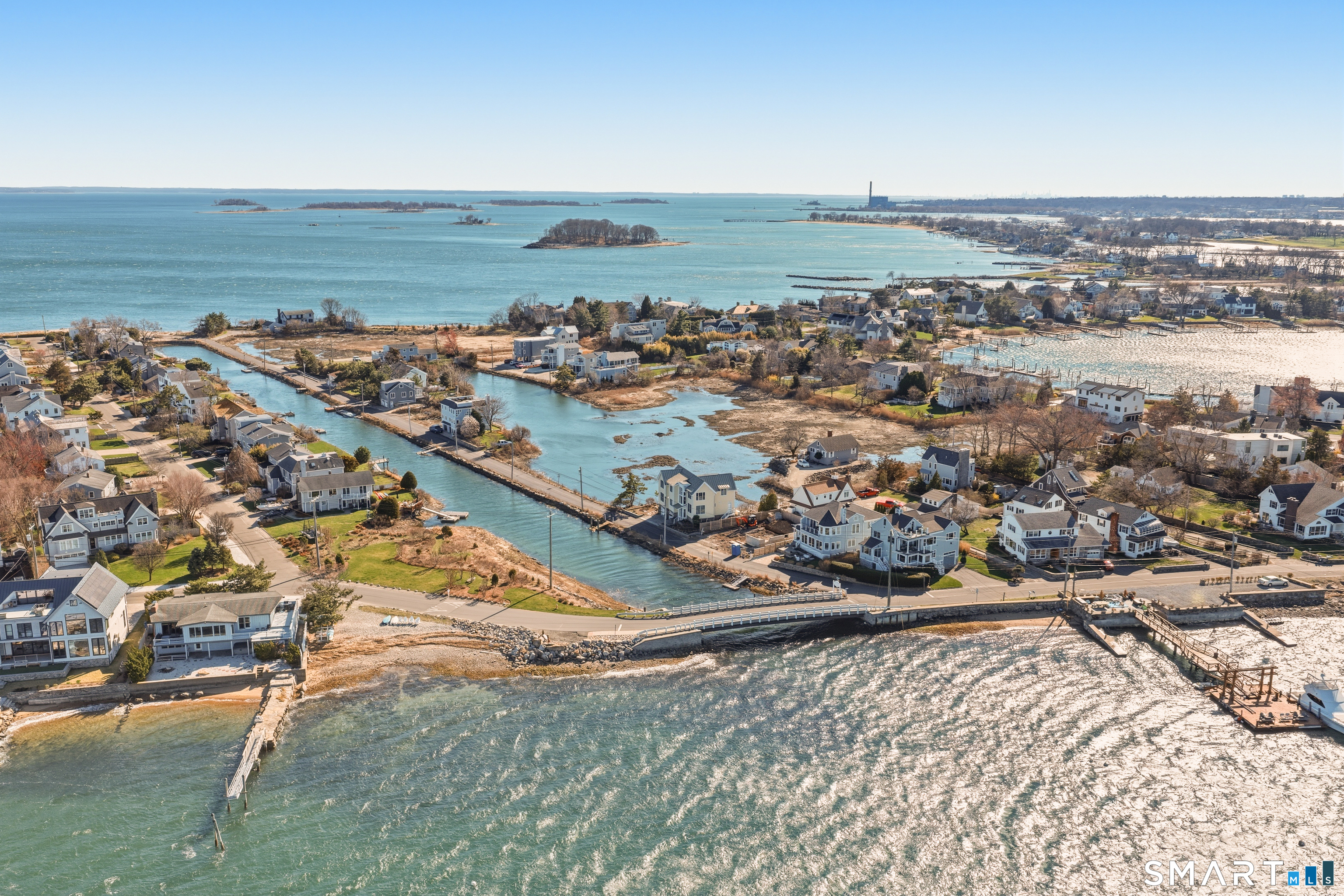 9 Marsh Road Westport, CT 06880 - Photo 2 of 39 an aerial view of ocean and residential houses with outdoor space