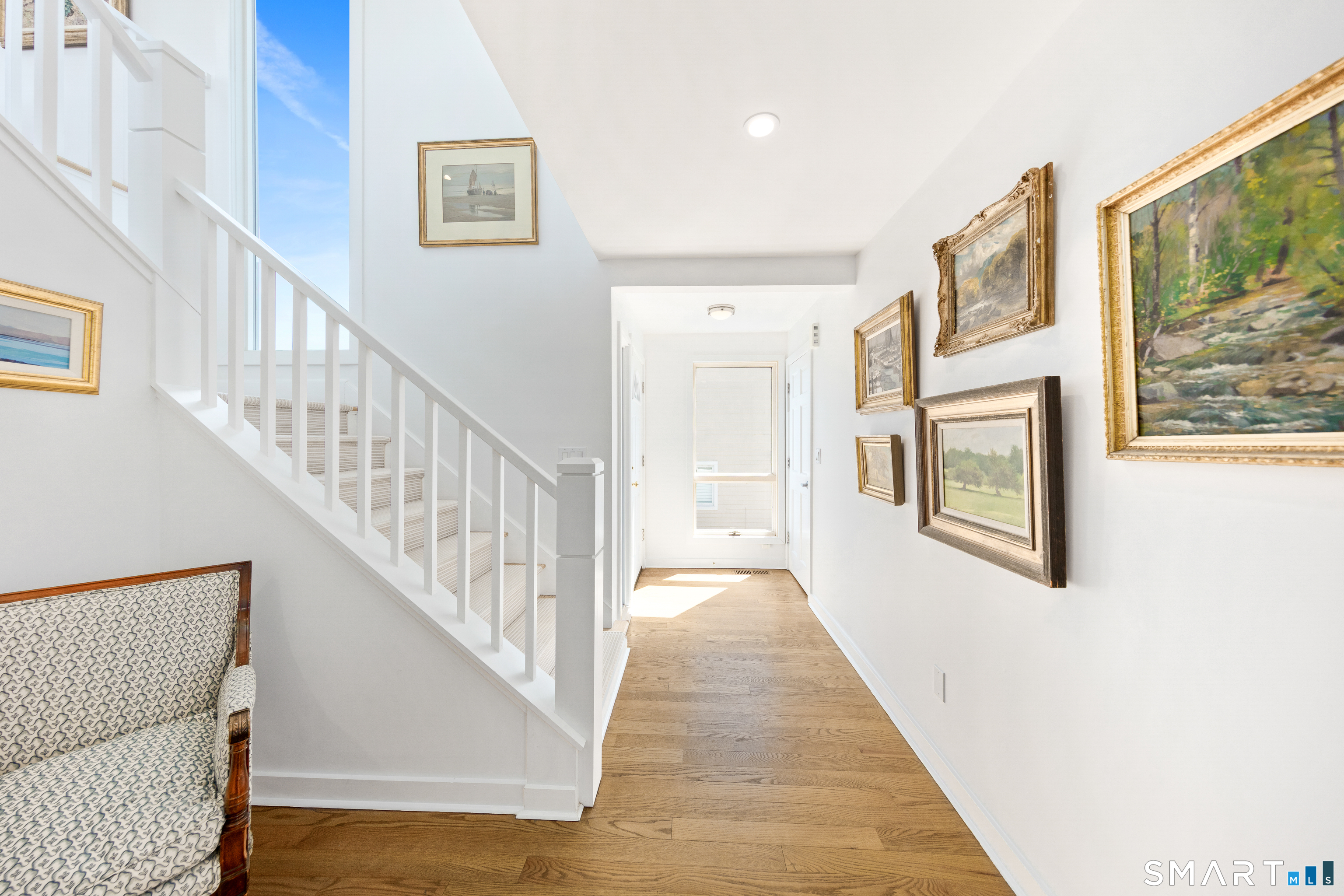 9 Marsh Road Westport, CT 06880 - Photo 22 of 39 a view of a hallway with windows