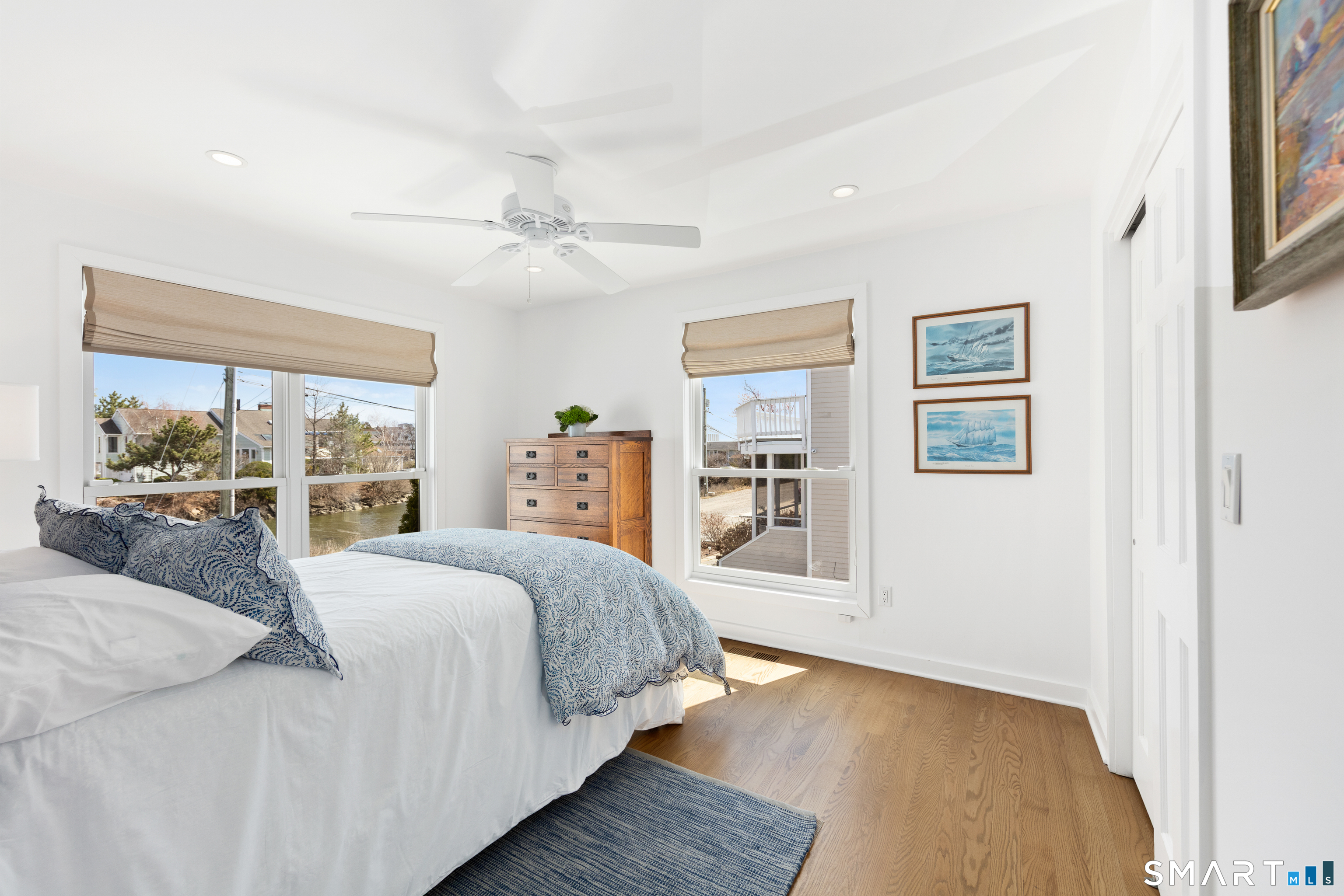 9 Marsh Road Westport, CT 06880 - Photo 26 of 39 a bedroom with a large bed and a window