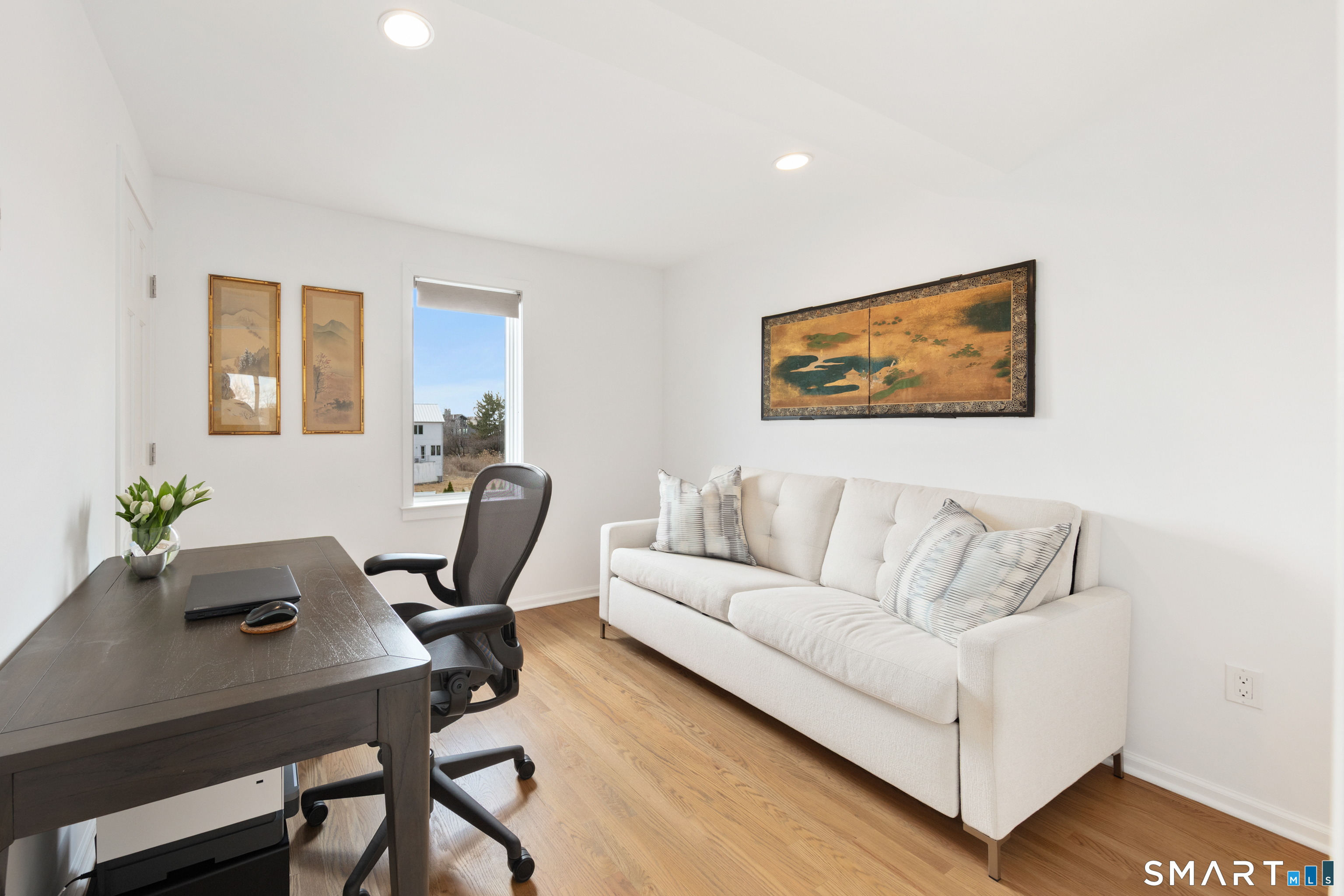 9 Marsh Road Westport, CT 06880 - Photo 28 of 39 a living room with furniture and a table