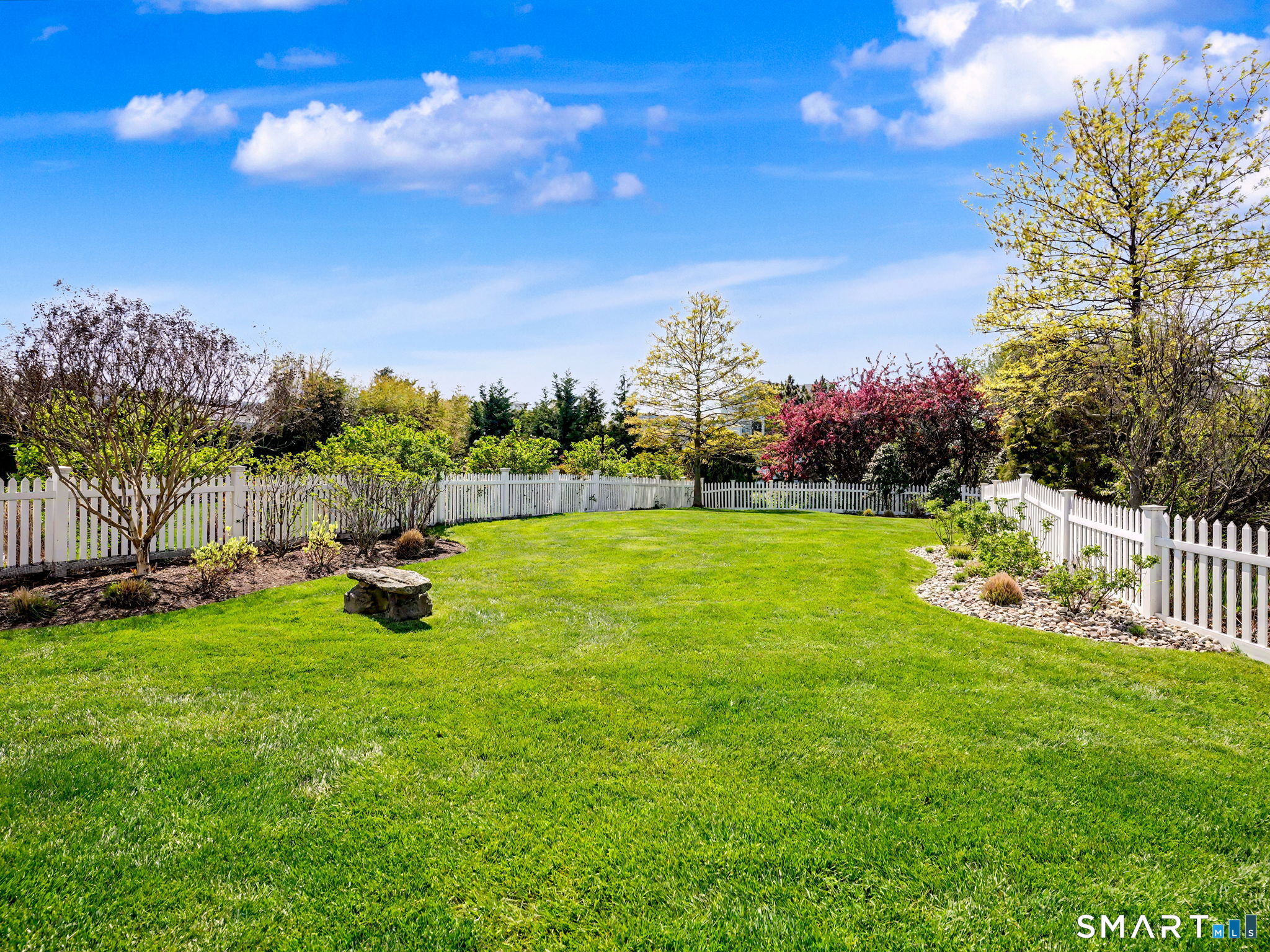9 Marsh Road Westport, CT 06880 - Photo 5 of 39 Fenced-in and professionally landscaped, quiet and level, backyard with irrigation and an outdoor shower.
