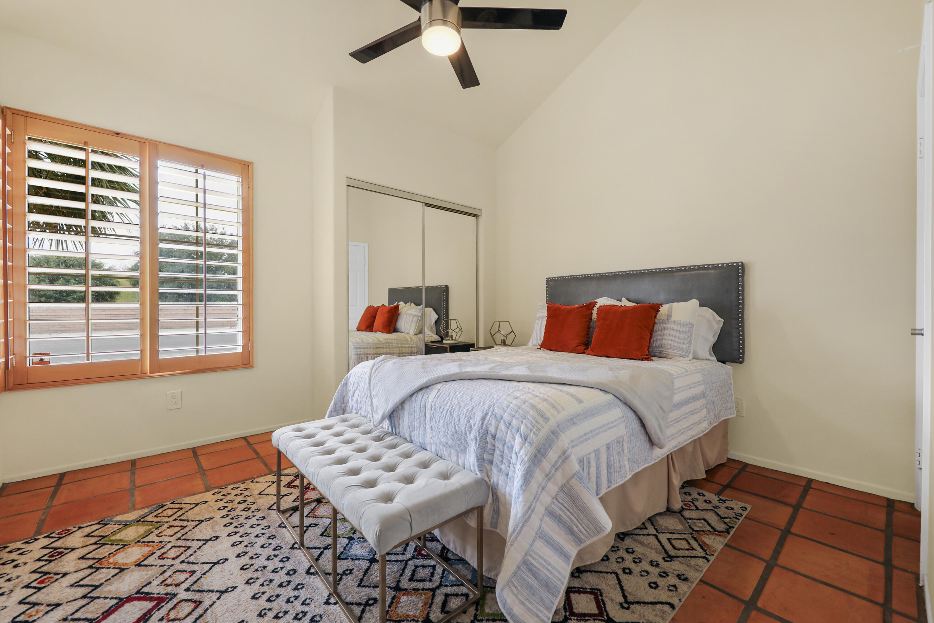 80380 Paseo Encanto Indio, CA 92201 - Photo 19 of 32 a bedroom with a bed and a window